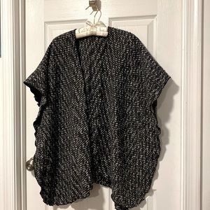 This is a handmade wrap/vest cover up. It’s soft, warm, stylish & unique😁